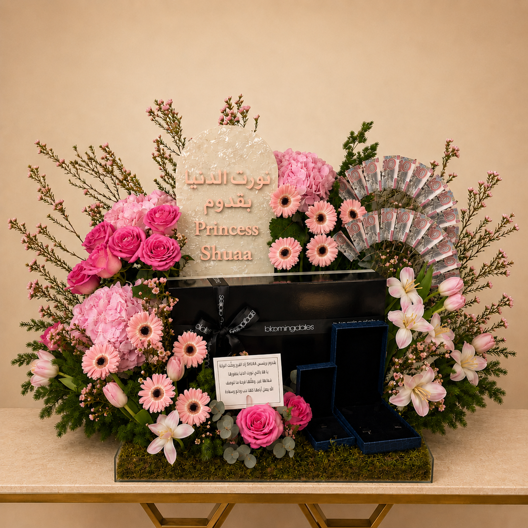 Clear acrylic tray 50/50cm
Pink roses 
Pink hydrangea 
Gerbera pink 
Pink tulip 
Pink Wax Fleur 
Sparks Green 
Flat Mousse Green 
Acrylic painting 
Stand Flos